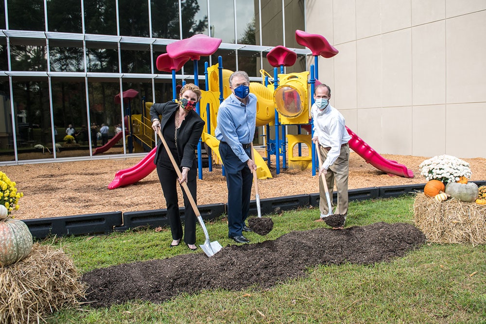 Lauren Koontz, CEO and president of the YMCA of Metro Atlanta, Mike Mason, Peachtree Corners Mayor and Mark Thornell, executive director of the Robert D. Fowler Family YMCA, break ground on the John Manning Playground.  