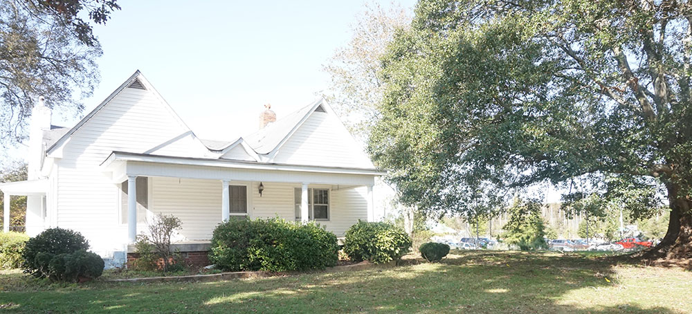 This was the home of J.B. Williams and is located adjacent to the park named after him on Five Forks Trickum Road.  The large water oak in front of the house is being protected and under the supervision of the county arborist.