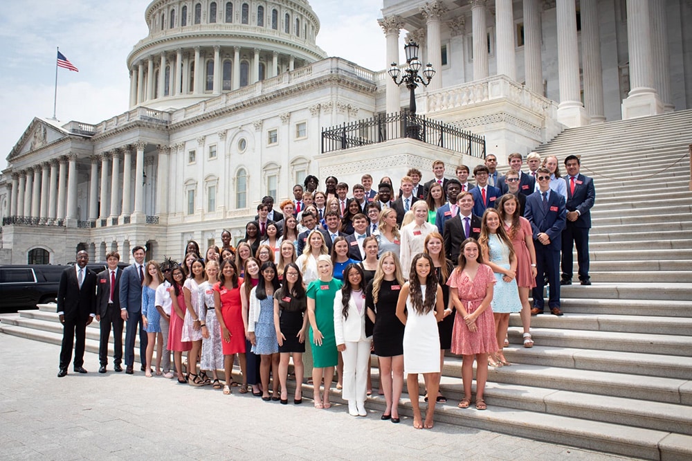 Pictured are Senators Jon Ossoff and Raphael Warnock with the 2022 Georgia delegation on the steps of the United States Capitol. (Special Photo)