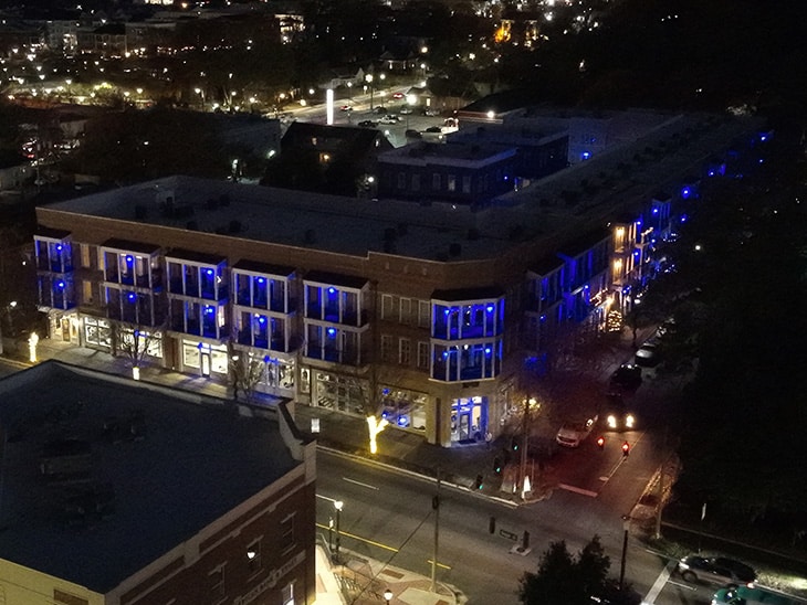 Drone shot of the Cornerstone Community lit with blue lights. (Special Photo)