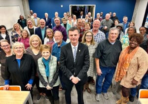 John Mullin (center), police chief final candidate, with attendees at the Meet & Greet event organized by the Cornerstone Community. (Photo by Bruce Johnson)