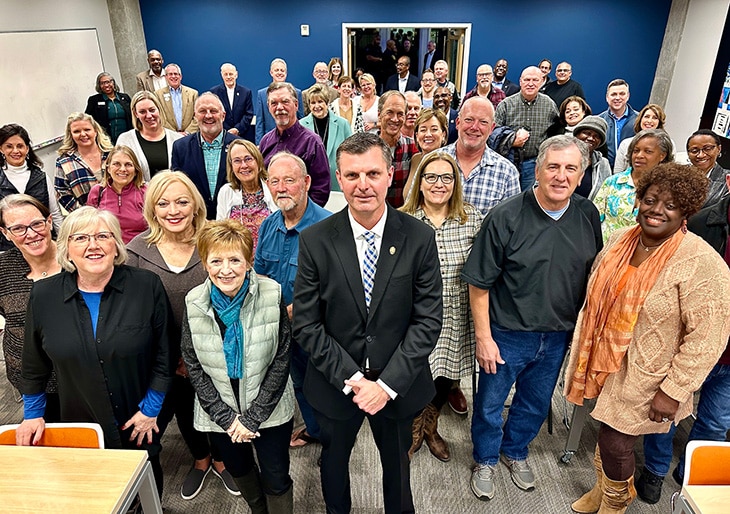 John Mullin (center), police chief final candidate, with attendees at the Meet & Greet event organized by the Cornerstone Community. (Photo by Bruce Johnson)