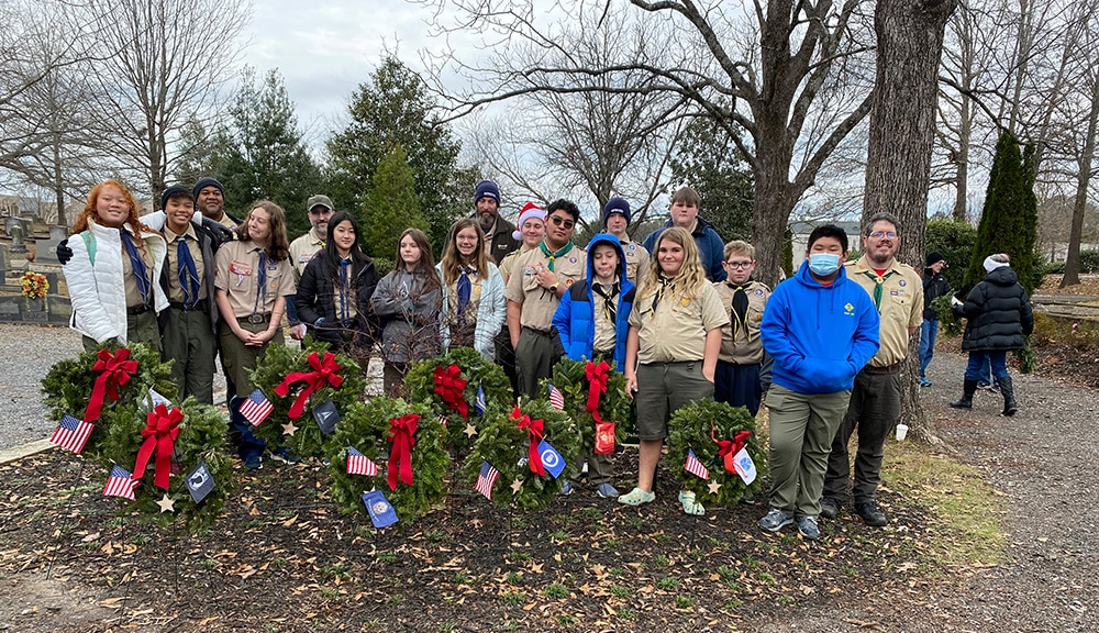 Boy Scouts of America Troops 419 and 420, Duluth United Methodist Church, assist Duluth's William Day Chapter, NSDAR, with their first Wreaths Across America ceremony at the Duluth Cemetery. (Special Photo)