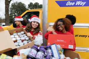 GAC High Schoolers load food for Can-A-Thon